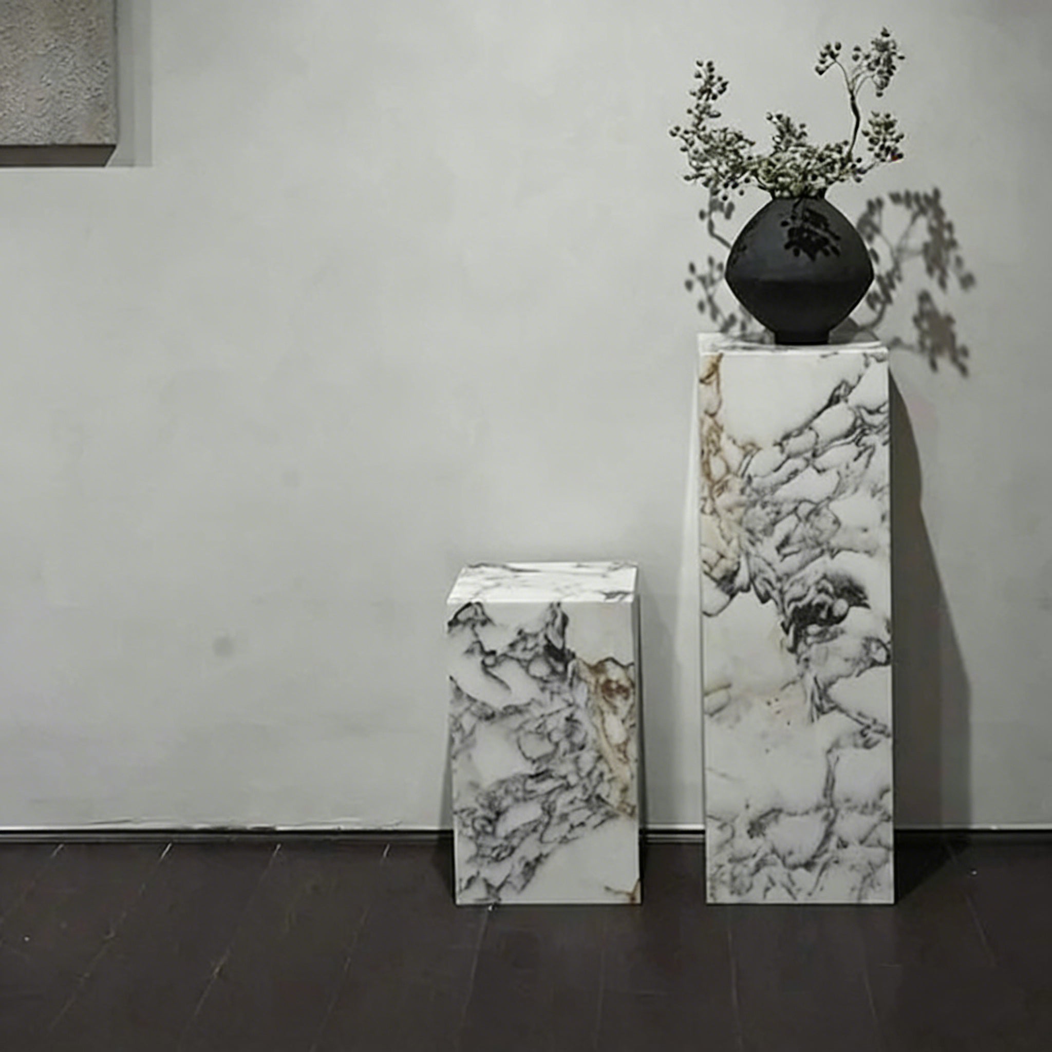 White marble tall plinth styled in a contemporary Australian interior