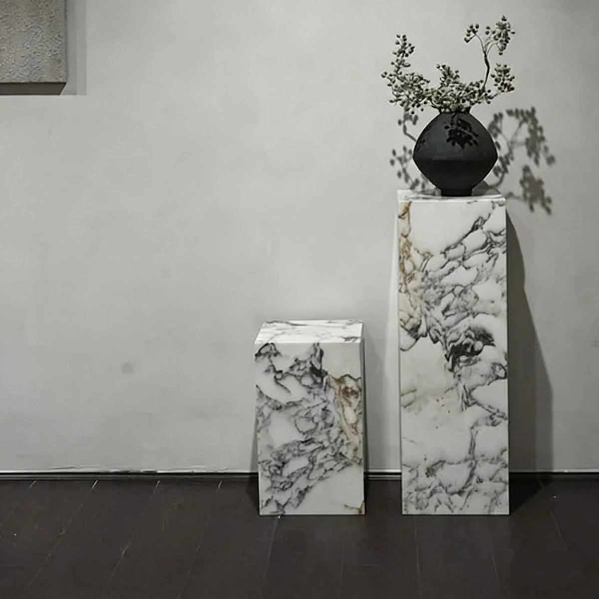 White marble tall plinth styled in a contemporary Australian interior