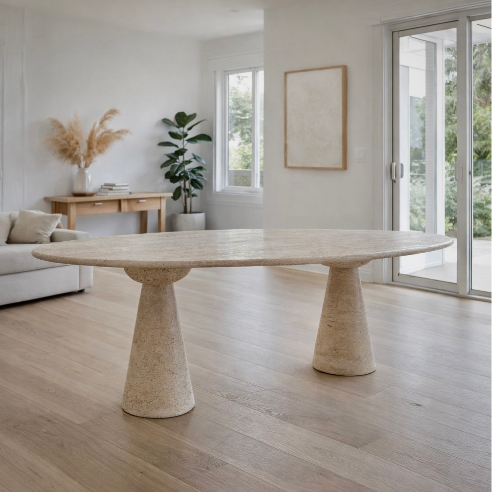 Oval travertine dining table styled in Australian home - Kozy Nest