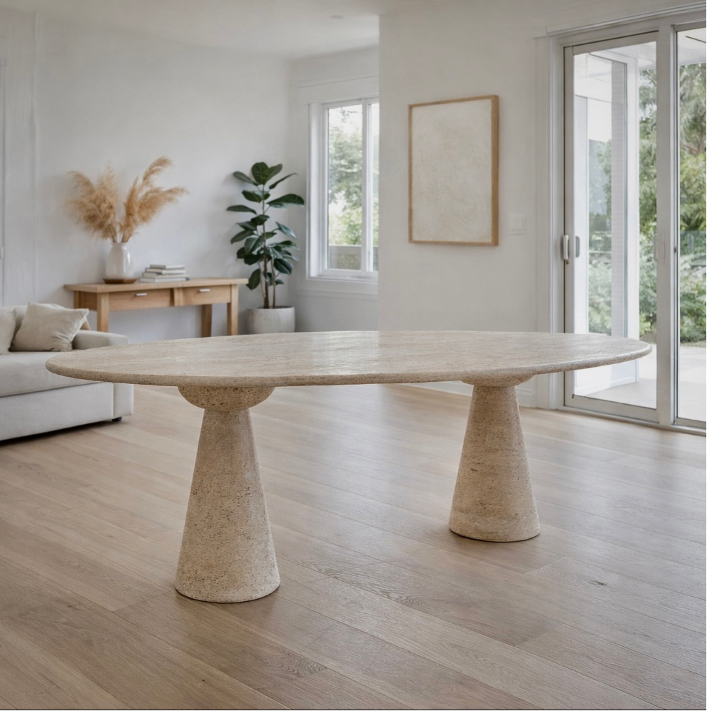 Oval travertine dining table styled in Australian home - Kozy Nest