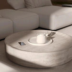 Round Travertine Table in Living Room with Sunshine